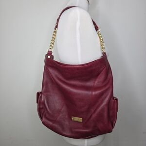 Brahmin Red Shoulder Women handbag Metal logo plate shows visible scratches